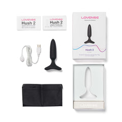 Lovense Hush 2 product with packaging, USB cable, and user manual on a white background
