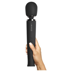 Le Wand Rechargeable Massager in black with smooth body and attachment, designed for personal wellness and relaxation.