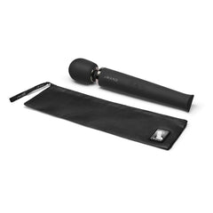 Le Wand Rechargeable Massager in black with a sleek design, showing the wand and attachment against a neutral background.