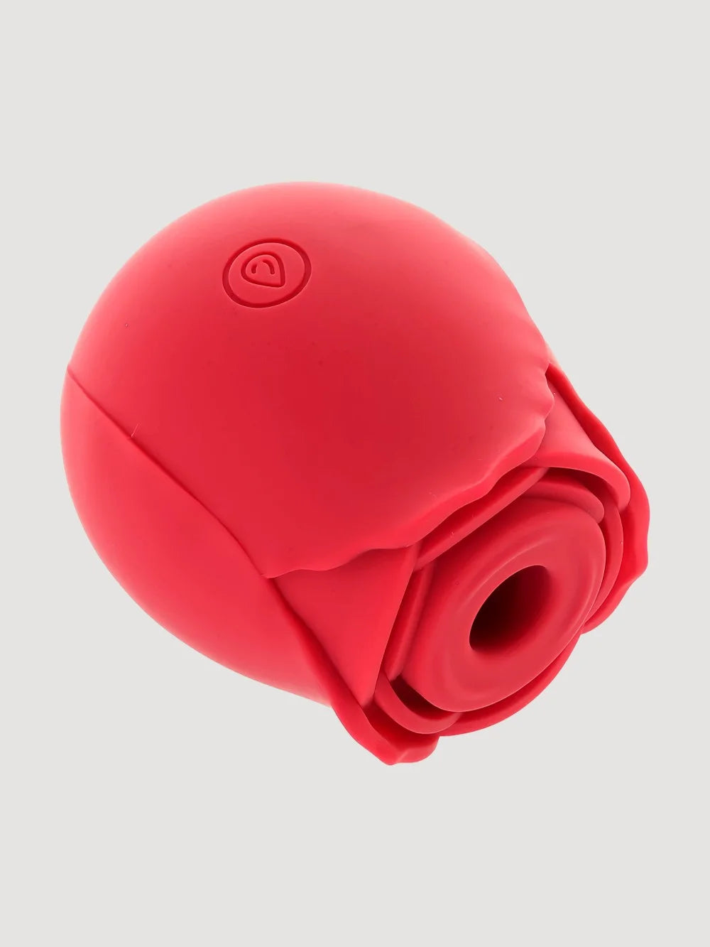 Me You Us Rosebud silicone clitoral suction vibrator with rose design, showing the textured surface and suction nozzle.