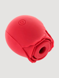 Me You Us Rosebud silicone clitoral suction vibrator with rose design, showing the textured surface and suction nozzle.