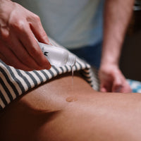Thumbnail for a man getting a back massage from a woman