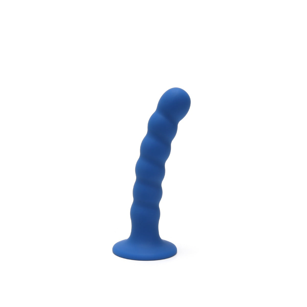 a blue dildo sitting on top of a white surface