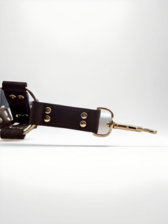 Luxury Nubuck Leather 4-Way Hog Tie with durable gold attachments, embodying elegance and function in bondage gear by Bound to Please.