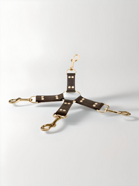Premium Nubuck Leather 4-Way Hog Tie providing versatile restraint options, showcasing stylish design and high-quality gold hardware by Bound to Please.