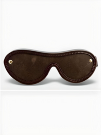 Nubuck Leather Blindfold, showcasing its elegant curved shape perfect for sensual exploration and restraint play.