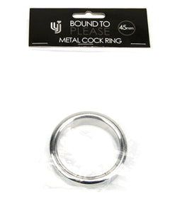 a metal cock ring in a package on a white background