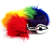Close-up of the Furry Fantasy Rainbow Tail Butt Plug showcasing its vibrant faux fur tail, perfect for adding style to your intimate play.