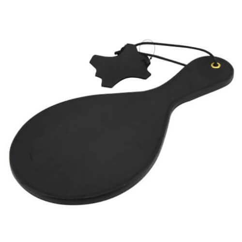 Bound Noir nubuck leather paddle with brass stud detail, designed for intimate use in BDSM play.