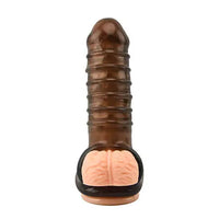 a brown and pink toy with a large piece of flesh inside of it