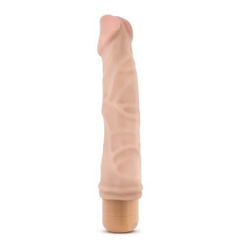 a flesh toy with a wooden handle on a white background