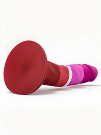 Avant Lesbian Pride Silicone Suction Dildo displayed at an angle, emphasising its elegant curves and proud colours, an ideal choice for enhancing intimate moments.