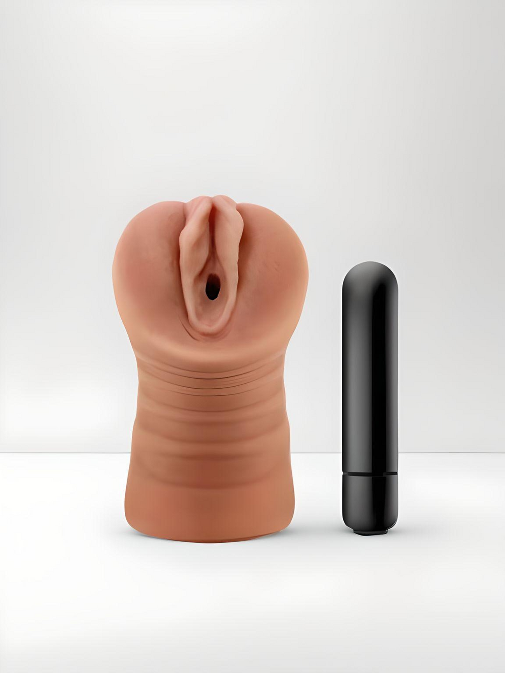 Julieta realistic male vibrator by Blush Novelties, soft waterproof masturbator with ribbed canal, open-ended design, 1-speed bullet.