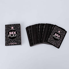 Adult sex play playing cards by Secret Play, featuring 55 cards for adult fun, laid out on a table with colorful designs.