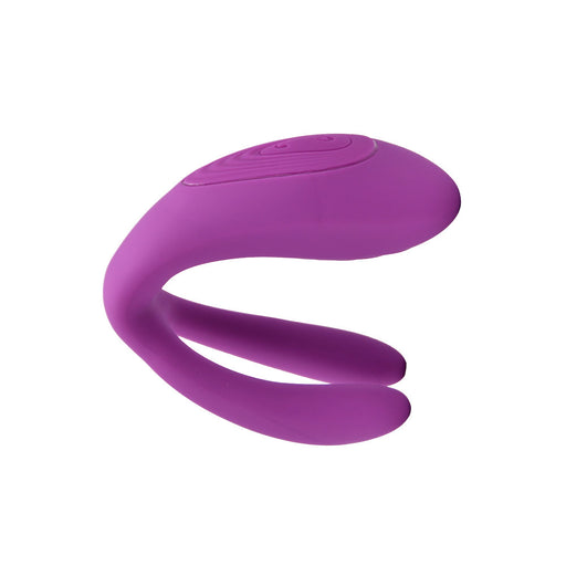 a close up of a purple object on a white background