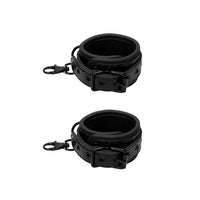 Thumbnail for a pair of black leather cuffs on a white background