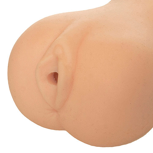 a close up of a fake breast on a white background