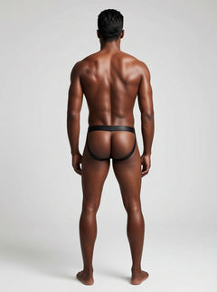 Envy metallic black men's jock strap with supportive design and adjustable waistband, featuring shiny black fabric and minimal coverage.