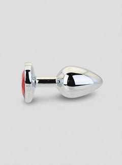 Toosh Heart Shaped Metal Butt Plug with Red Stone - S, M and L, close-up of the red gemstone heart detail on a metal Butt Plug