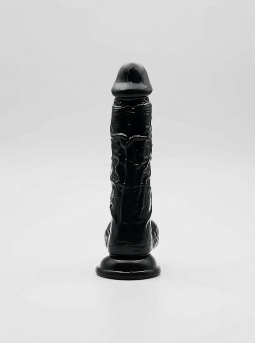 Realistic black dildo with suction cup and testicles from Loving Joy, designed for versatile adult pleasure use.