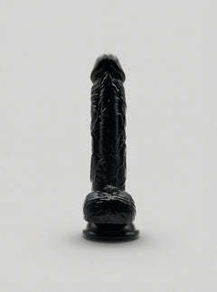 Loving Joy realistic black dildo with suction cup and testicles, designed for versatile adult pleasure use.