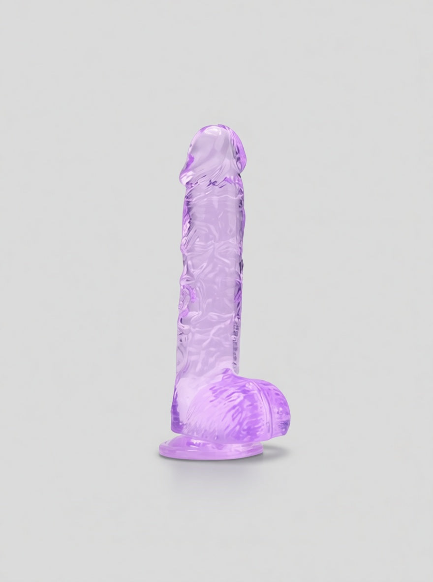 Pink or purple Loving Joy jelly crystal dildo with attached balls, designed for intimate pleasure and realistic sensation.