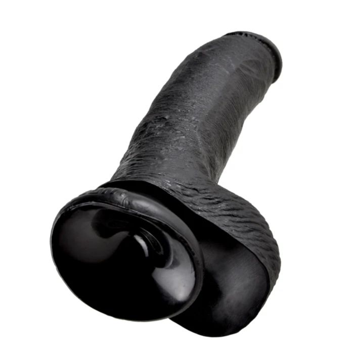 a close up of a black object on a white background