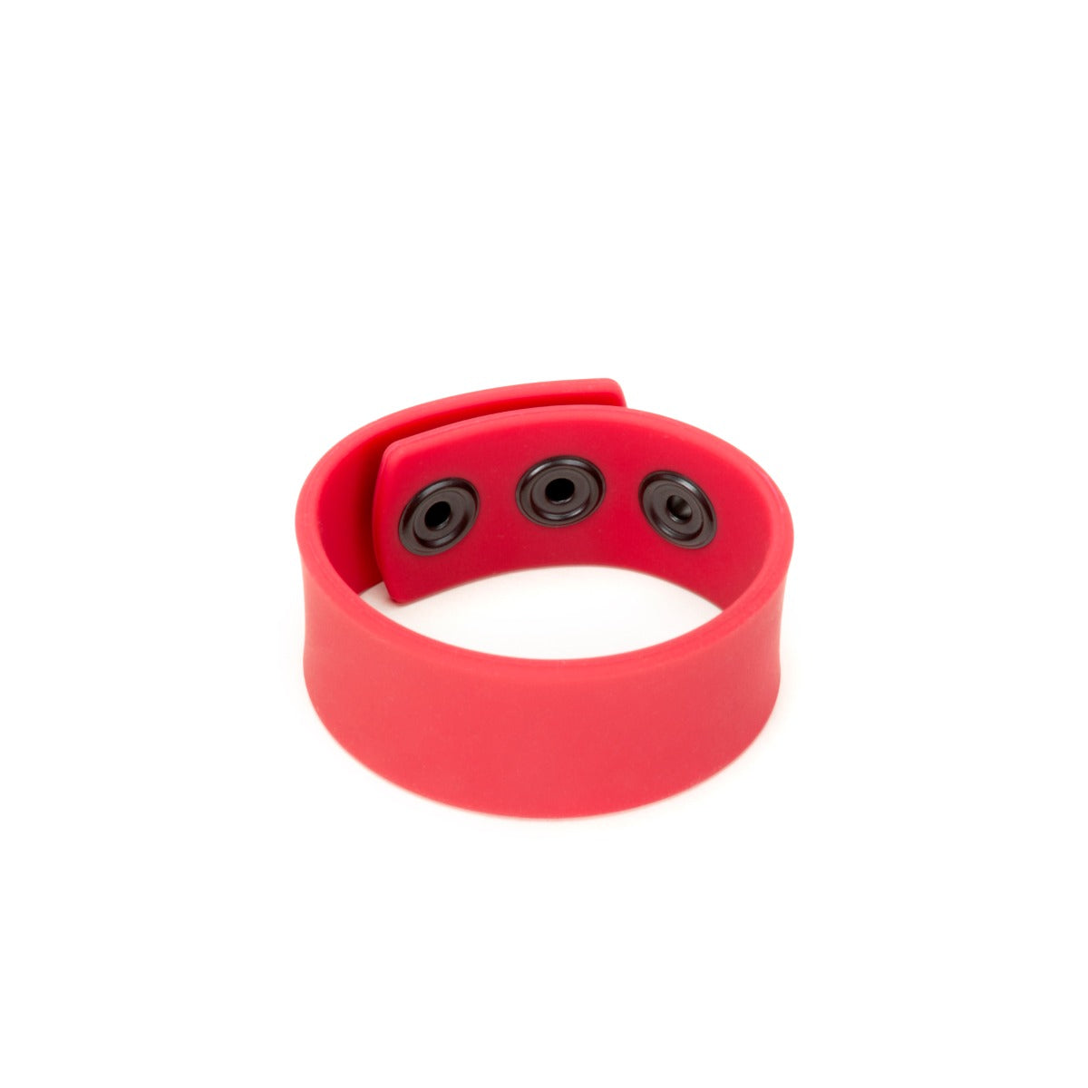 a red bracelet with two black buttons on it