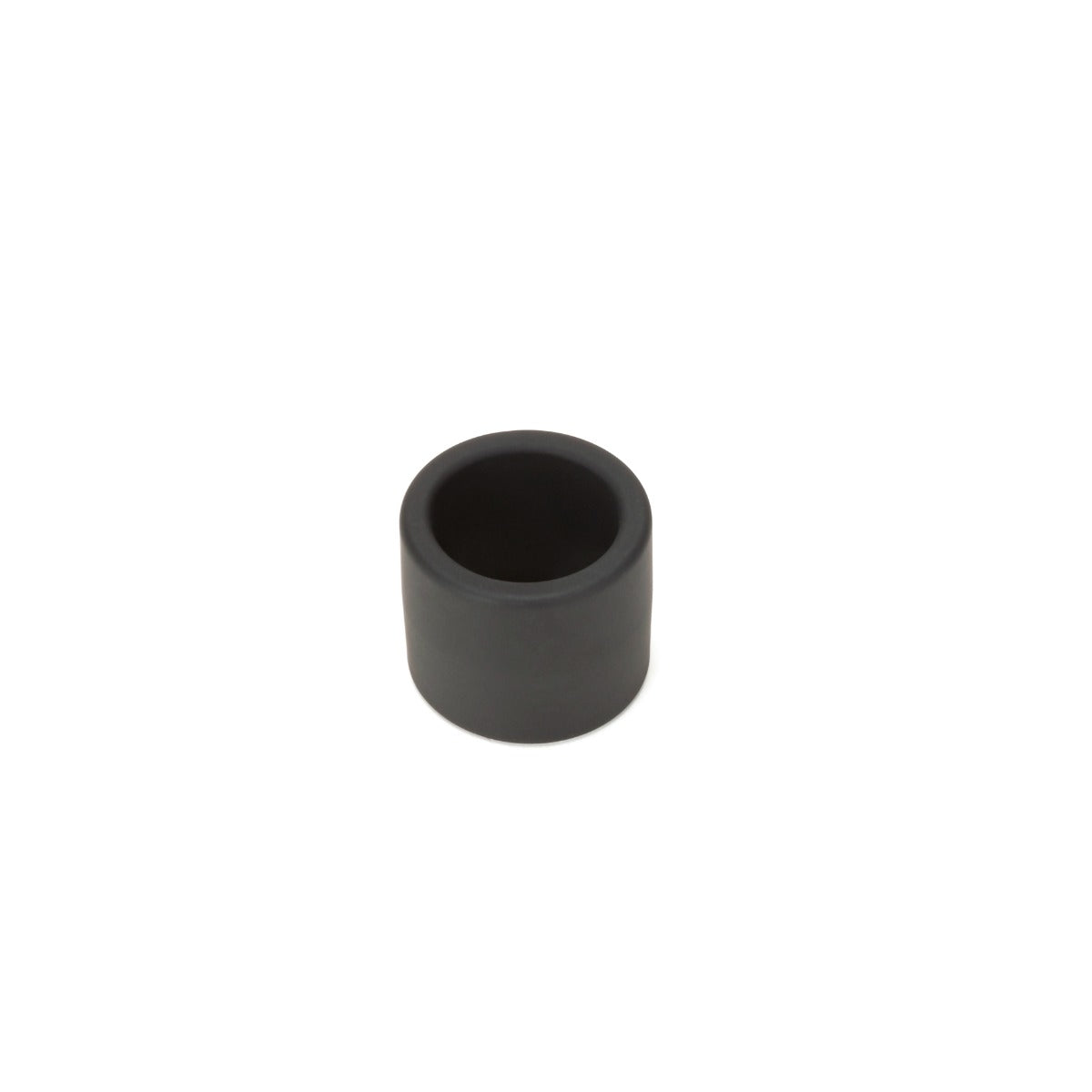 a black plastic tube on a white background