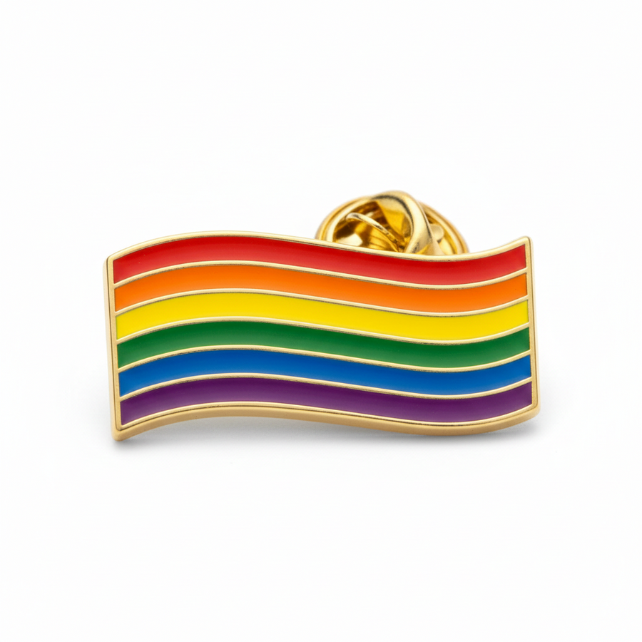 Colorful rainbow pride enamel pin by Scandals featuring a vibrant rainbow flag design.