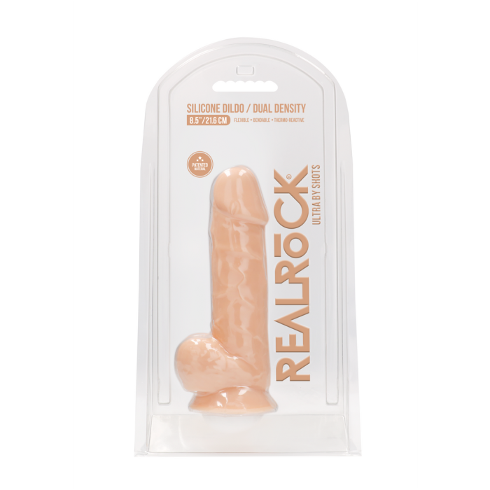 RealRock Ultra Dual Density Silicone Dildo Flesh 8.5 Inch with suction cup base displayed against a luxurious background.