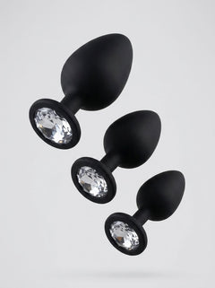 Detail image of Toosh Silicone Butt Plug Set of 3 – Black with Clear Gem Base, highlighting the smooth body-safe silicone material.