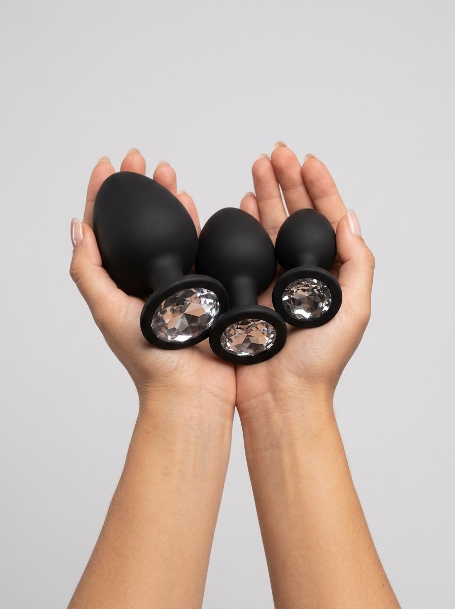 Toosh Silicone Butt Plug Set of 3 – Black with Clear Gem Base, showcasing the elegant design of this luxurious silicone butt plug set.