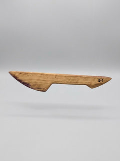 Handcrafted Barrel of Pain wooden BDSM scraper made from whisky barrel oak for kink and wax play, featuring double-ended design.