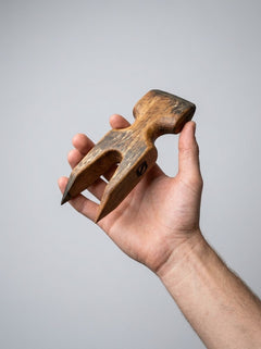 Barrel of Pain Fang scratcher BDSM accessory with metal claws and leather handle for sensory play and restraint.