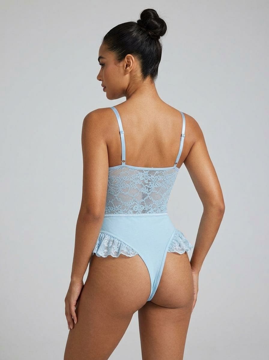 Luxury blue lace butterfly lingerie bodysuit with deep V-neck and ruffled trim from Scandals, featuring intricate lace details.