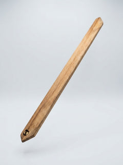 Barrel of Pain Slap Stick, a black leather flogger with multiple tails, designed for impact play and sensory stimulation.
