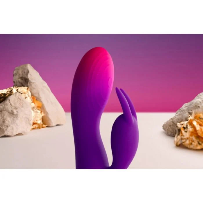 Rocks Off Glo-Girl rabbit vibrator with dual motors, flexible waterproof silicone, and 10 vibration modes.