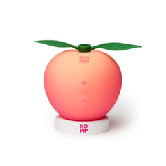 Romp Pink Peach Silicone Clitoral Suction Vibrator with textured surface and ergonomic design for targeted pleasure.