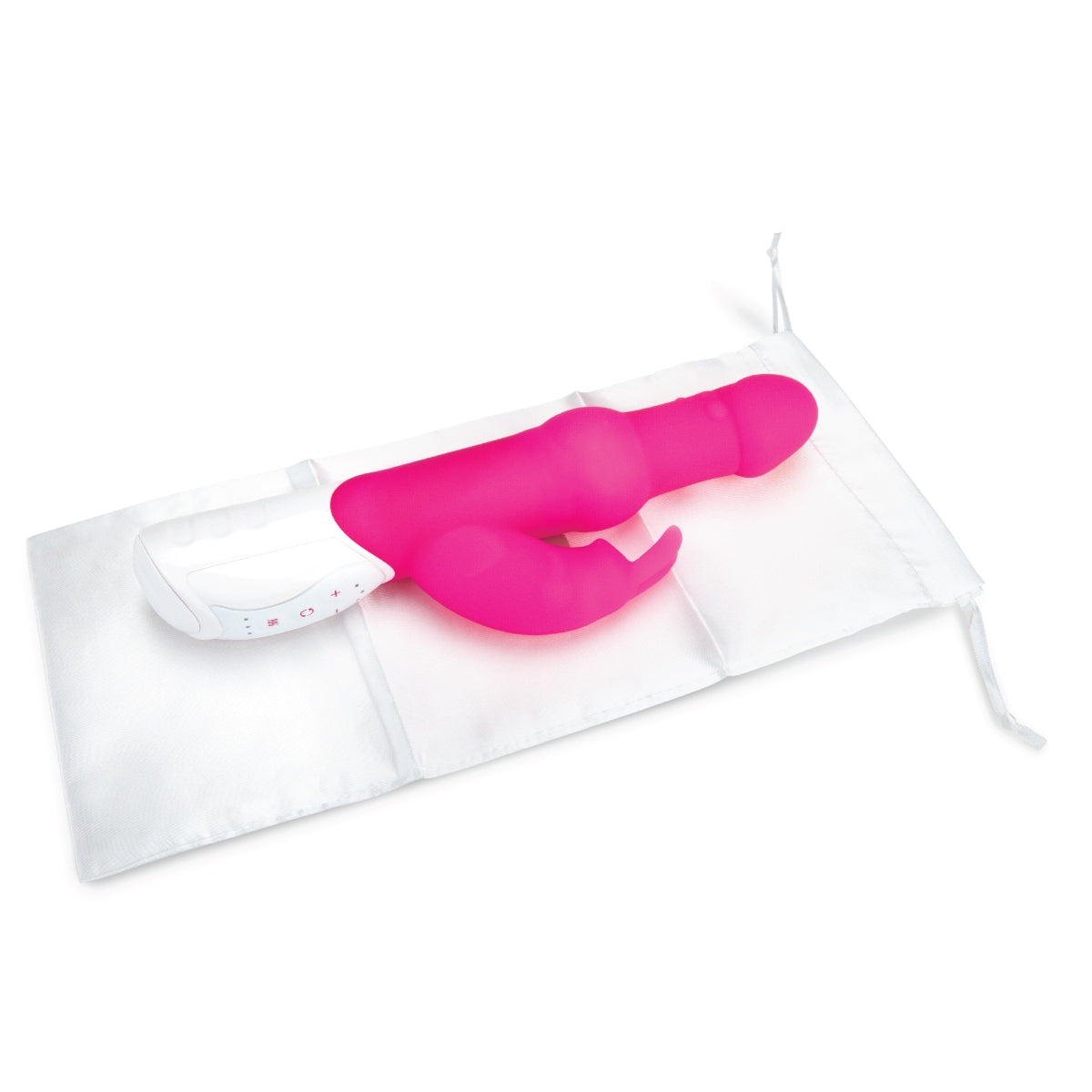 a pink rabbit vibrator sitting on top of a white bag