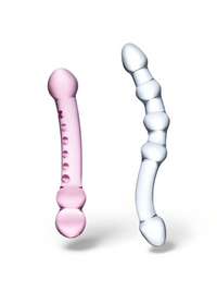 Glas 2 PC Double Pleasure Glass Dildo Set featuring two elegant double-ended glass dildos, one in pink and the other in clear, designed for luxurious sensual play.