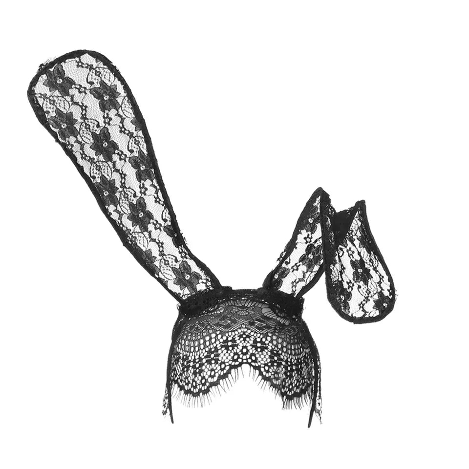 a black and white photo of a lace bunny ears headband with veil