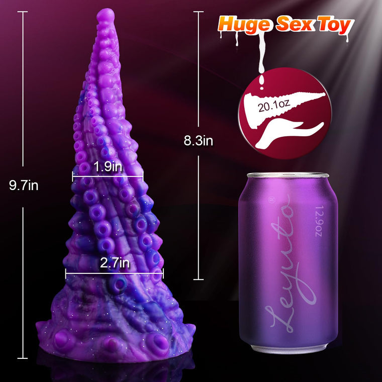 a purple next to a can of soda