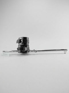 Adjustable 24-38 Inch Leather Leg Spreader Bondage Bar in a stylish setting - perfect leg spreader bondage tool for enhancing intimate experiences.