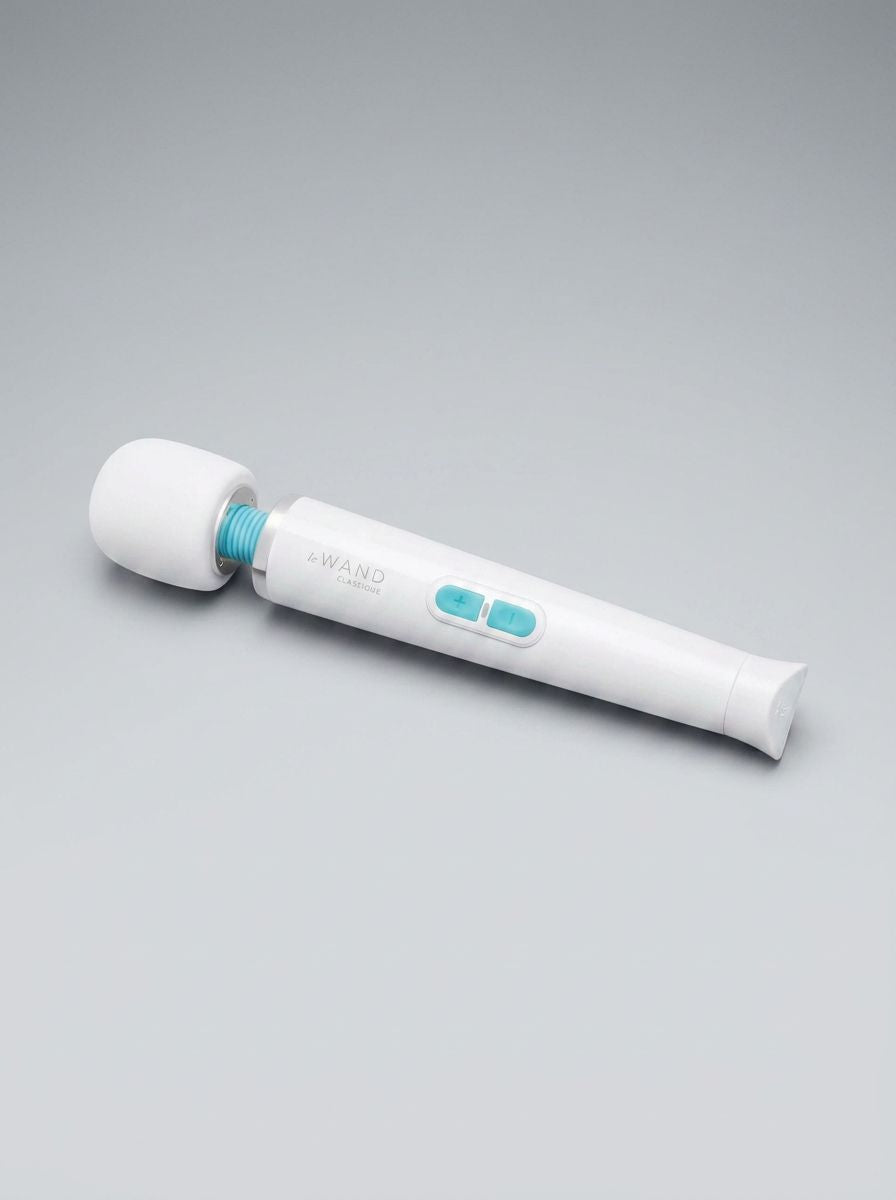 Le Wand Classique Petite vibrating wand massager in white, showing its compact design and smooth surface.