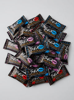 Sweet Treats Sex Chocolate, two 10g gourmet aphrodisiac chocolates, shown in elegant packaging designed for romantic indulgence.