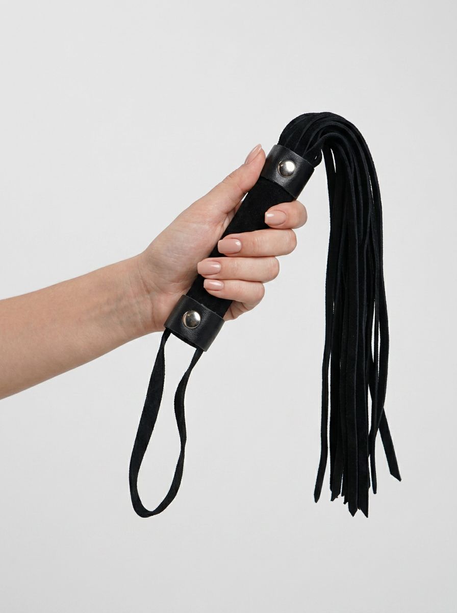 Short Suede Flogger - A luxurious and soft whip crafted from supple suede, designed for intense pleasure and precision control in intimate moments.