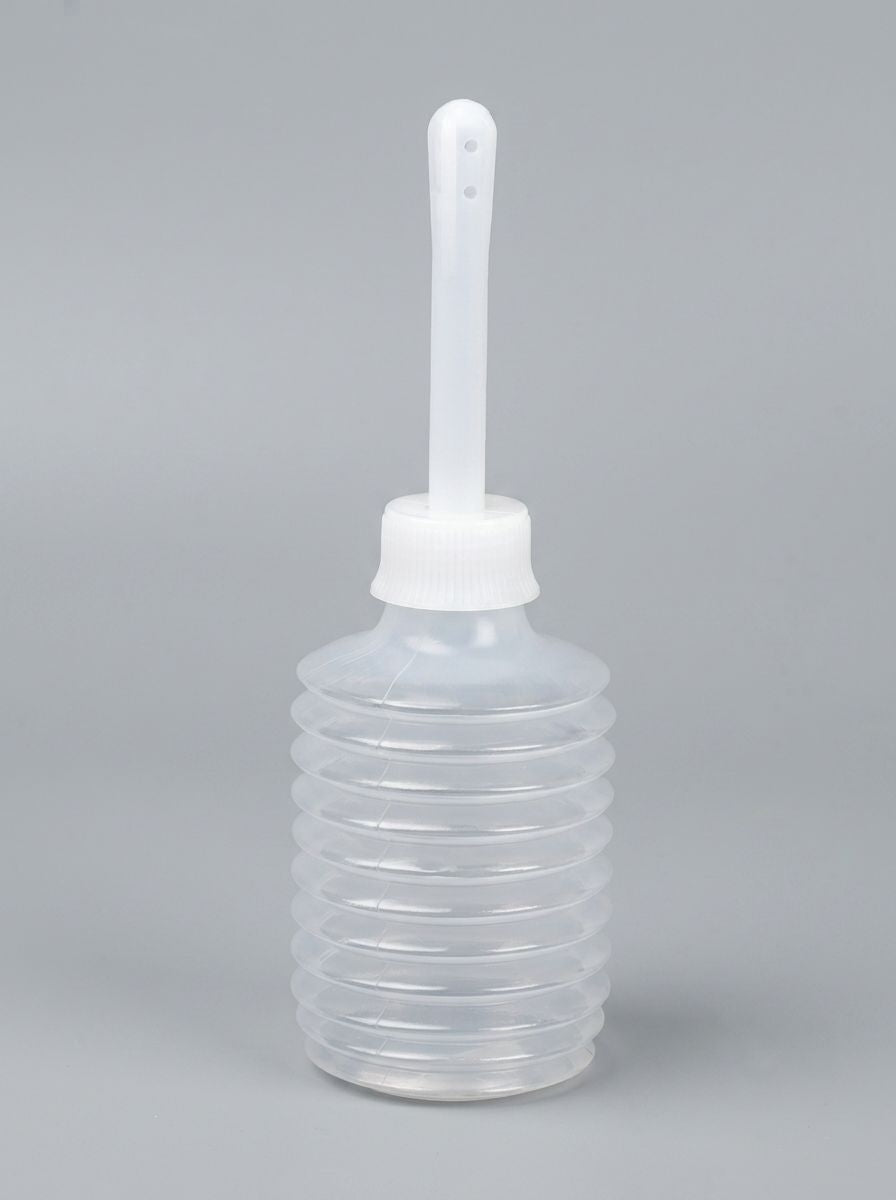 200ml disposable anal bulb douche by Scandals, enema irrigator for personal cleansing, with flexible bulb and nozzle.