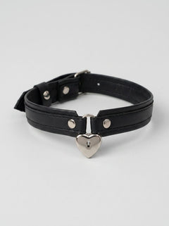 Display of the heart-shaped lock mechanism on the Strict Locking Heart Collar, illustrating the perfect blend of beauty and security for heart collar enthusiasts.