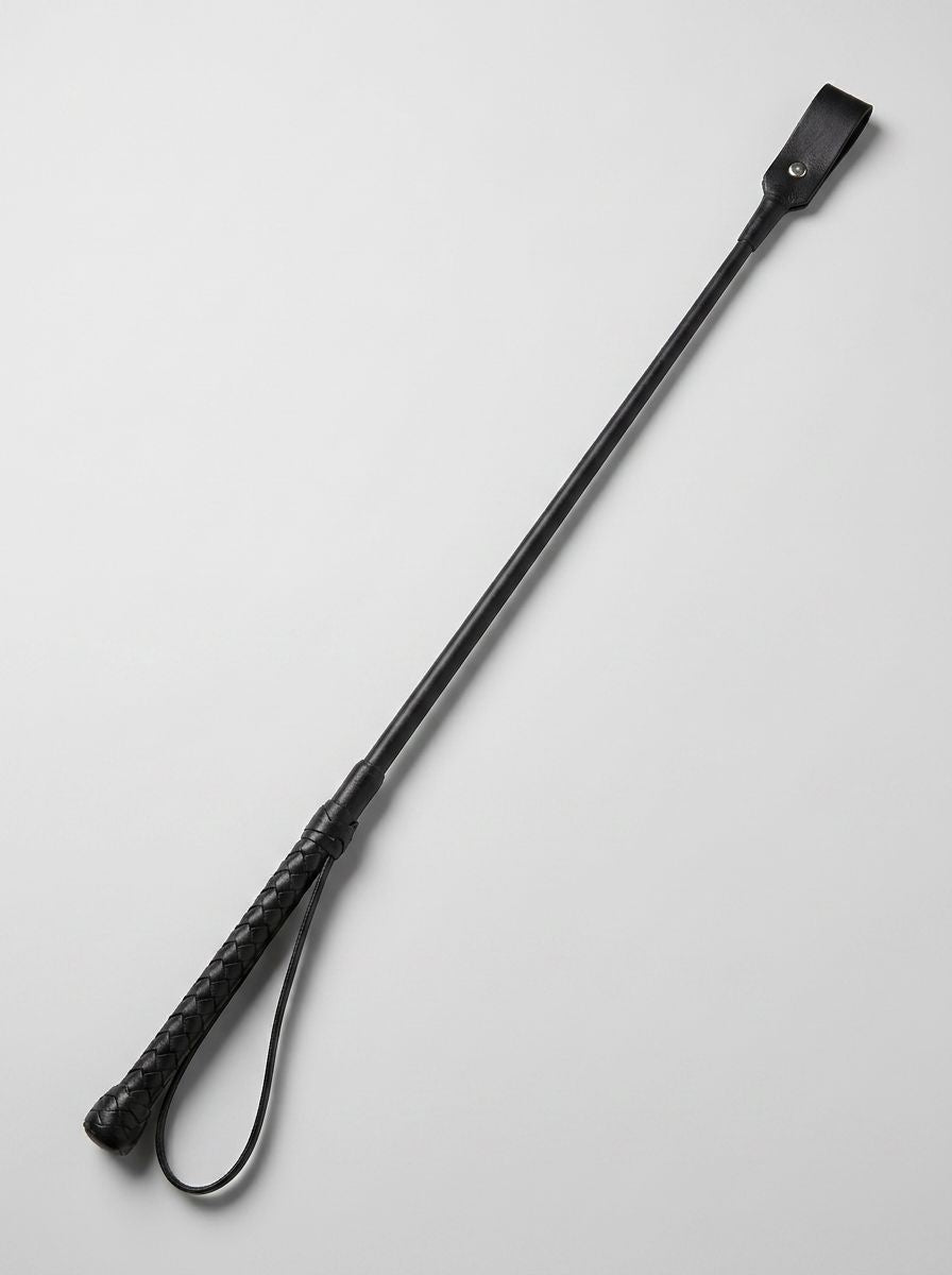Bound Noir Nubuck genuine leather BDSM riding crop with a sleek handle and sturdy tip, designed for impact play and control.